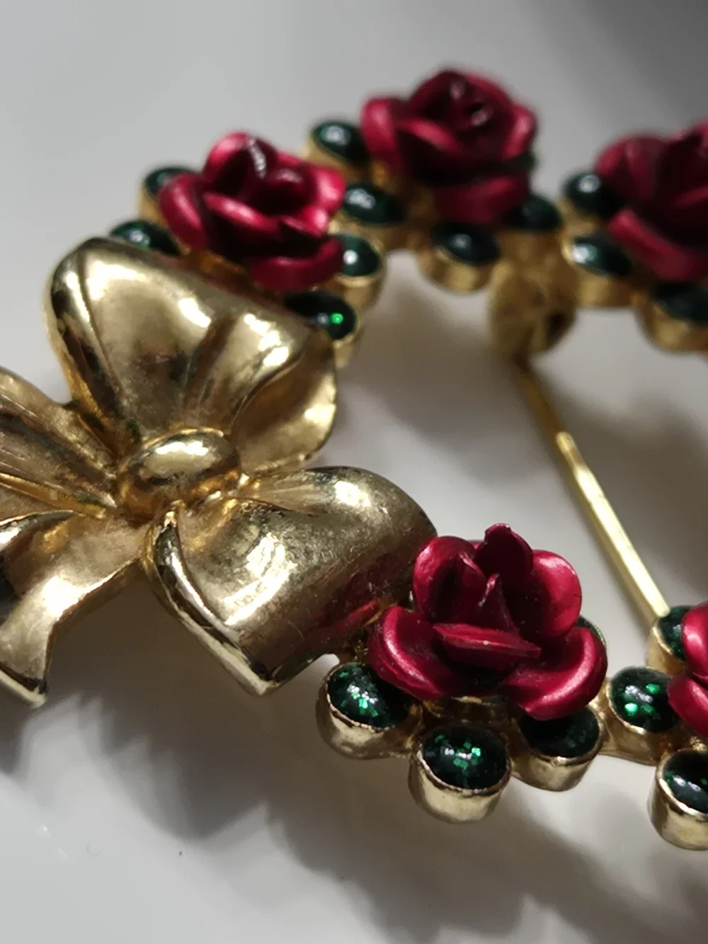Avon Gold Bow Wreath Brooch with Red Roses and Green Accents